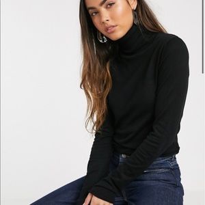 New with tags black turtleneck